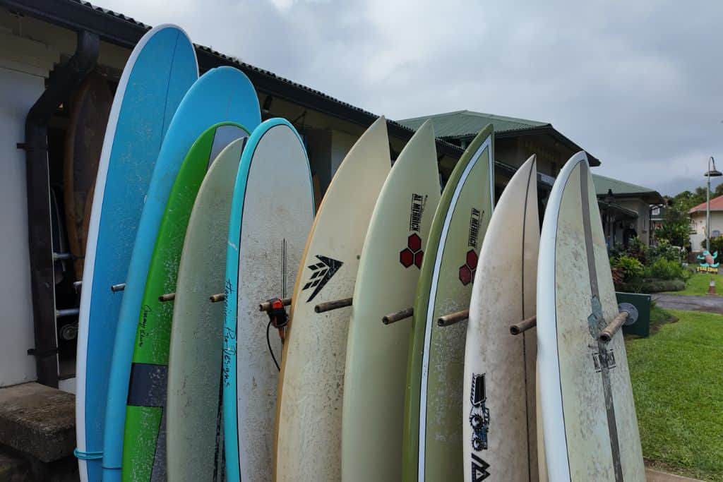 Surfboards on a rack outside a surf shop in Hanalei, Kauai.