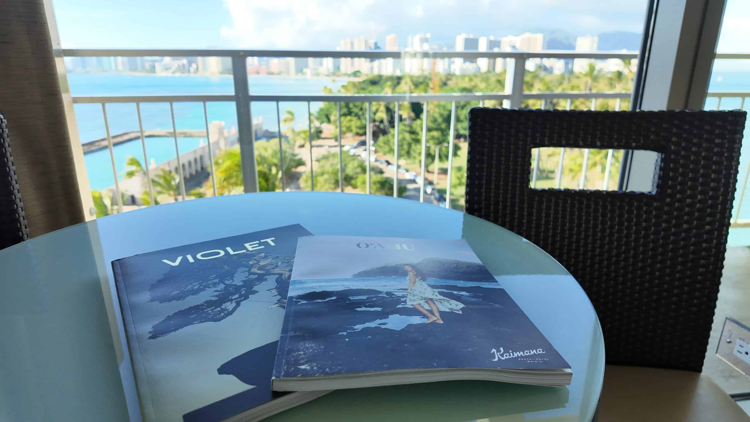 Tropical magazines on a table with Honolulu in the background