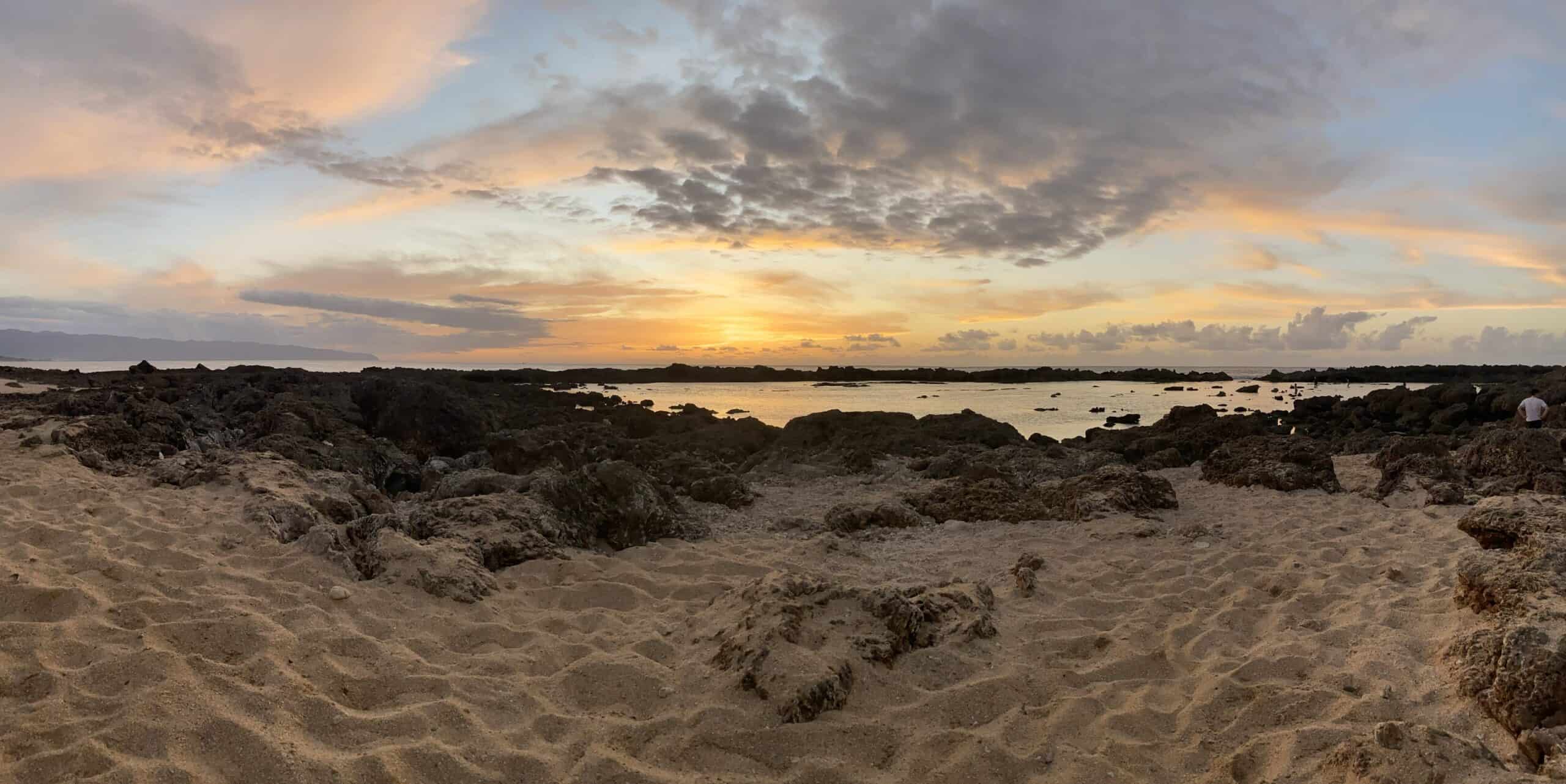 Sunset at a rocky beach 